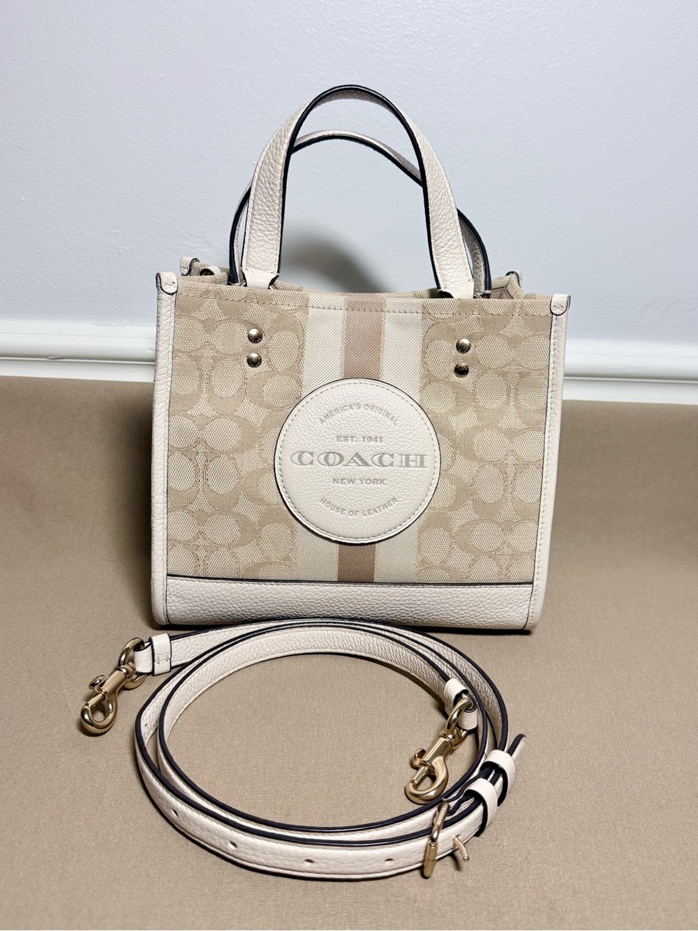 Authentic Coach Dempsey Tote 22 in the iconic Signature Jacquard logo in Cream